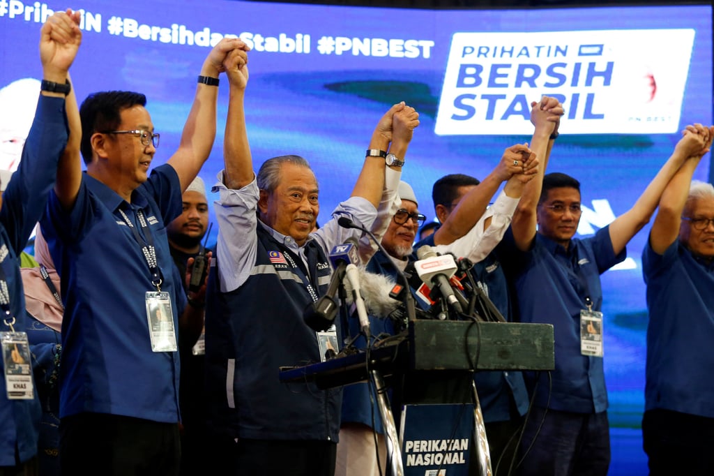 Perikatan Nasional chairman Muhyiddin Yassin (second from left) with other leaders after Malaysia’s 15th general election in Shah Alam on Sunday. Photo: Reuters Perikatan Nasional chairman Muhyiddin Yassin (second from left) with other leaders after Malaysia’s 15th general election in Shah Alam on Sunday. Photo: Reuters
