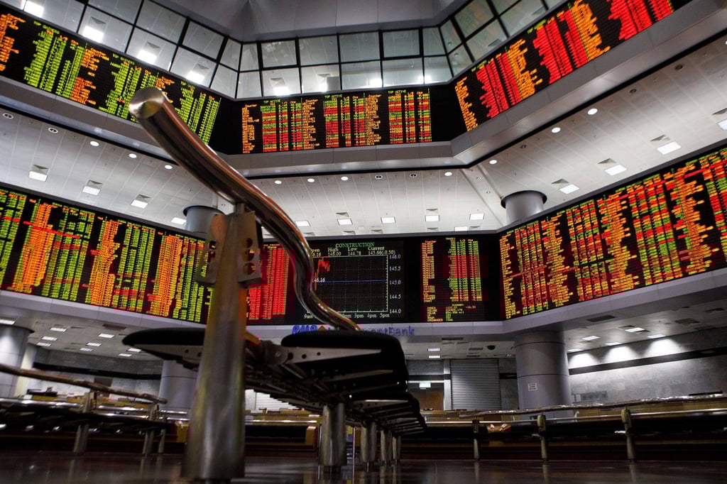 Stock prices displayed inside the trading gallery of the RHB Investment Bank Bhd. headquarters in Kuala Lumpur, Malaysia. Photo: Bloomberg Stock prices displayed inside the trading gallery of the RHB Investment Bank Bhd. headquarters in Kuala Lumpur, Malaysia. Photo: Bloomberg