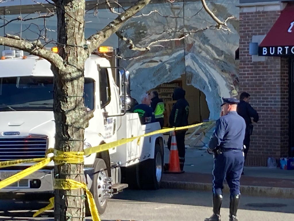 Police respond to the Apple Store on Derby Street in Hingham on Monday, where a driver crashed into the building. Photo: Boston Herald via TNS Police respond to the Apple Store on Derby Street in Hingham on Monday, where a driver crashed into the building. Photo: Boston Herald via TNS