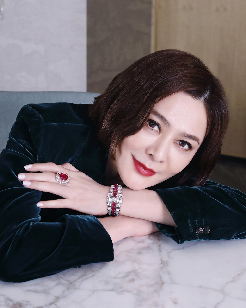 Rosamund Kwan wears a ruby and diamond ring that’s estimated to sell at auction for between HK$22 million and HK$35 million (US$2.8 million and US$4.5 million), and a diamond and ruby bracelet estimated to sell for between HK$500,000 and HK$800,000. Photo: Christie’s Images