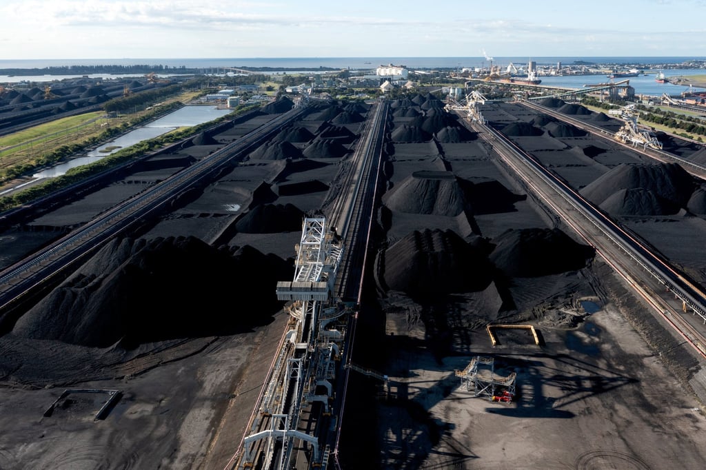 Coal is prepared for export at the Port of Newcastle in New South Wales, Australia. Photo: Bloomberg Coal is prepared for export at the Port of Newcastle in New South Wales, Australia. Photo: Bloomberg
