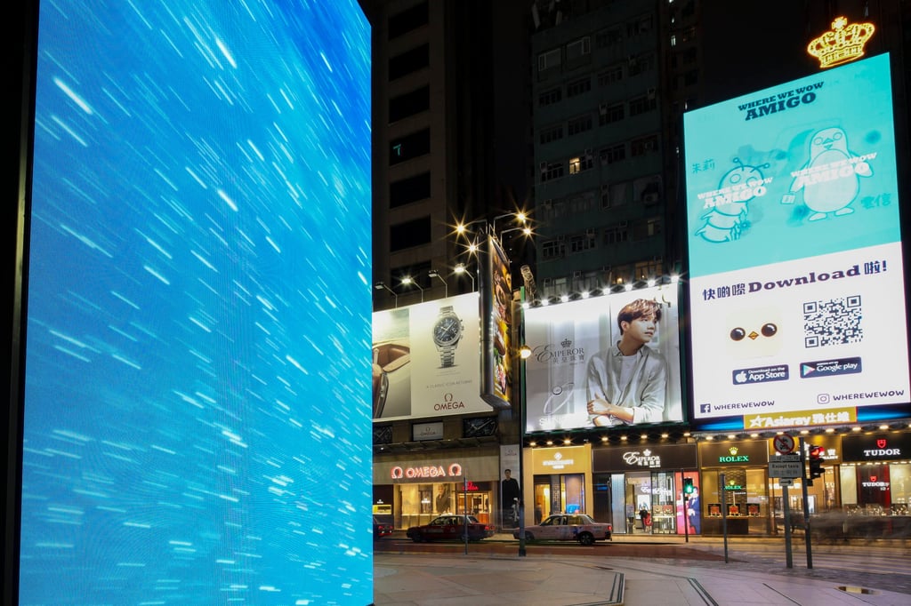 Advertising displays light up at Causeway Bay in Hong Kong on November 21, 2022. The district still ranks as the second most expensive in Asia-Pacific in terms of retail rents. Photo: Robert Ng