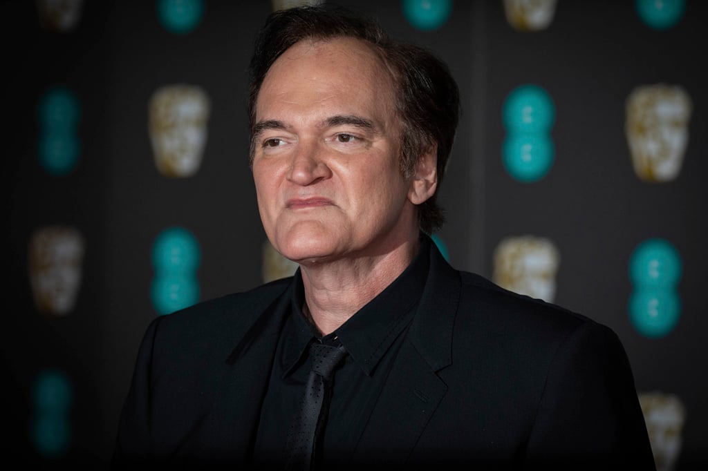 Director Quentin Tarantino poses for photographers upon arrival at the BAFTA Film Awards, in central London, in February 2020. Photo: AP Director Quentin Tarantino poses for photographers upon arrival at the BAFTA Film Awards, in central London, in February 2020. Photo: AP