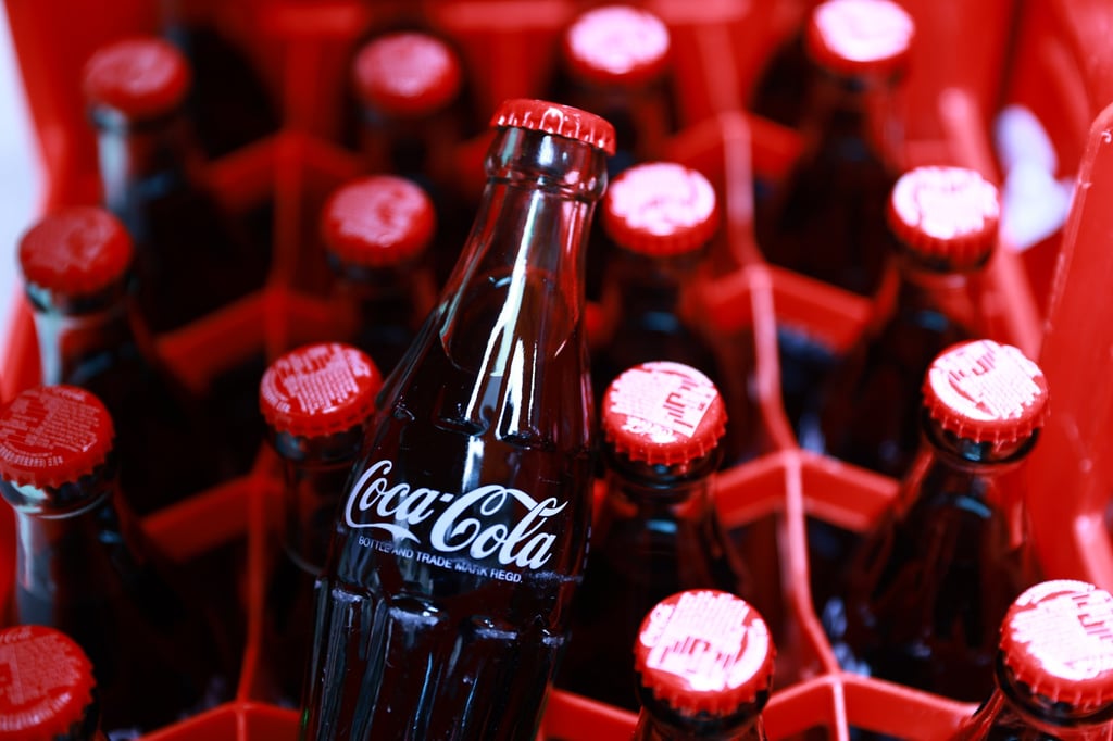 Berkshire Hathaway owns stakes in dozens of companies including Coca-Cola. Photo: May Tse