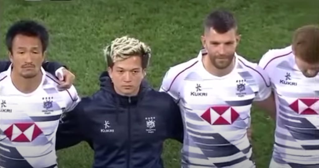 A video clip shows Hong Kong players and staff members looking puzzled and unimpressed as “Glory to Hong Kong” is played in place of China’s anthem at the rugby game in South Korea. Photo: Handout A video clip shows Hong Kong players and staff members looking puzzled and unimpressed as “Glory to Hong Kong” is played in place of China’s anthem at the rugby game in South Korea. Photo: Handout