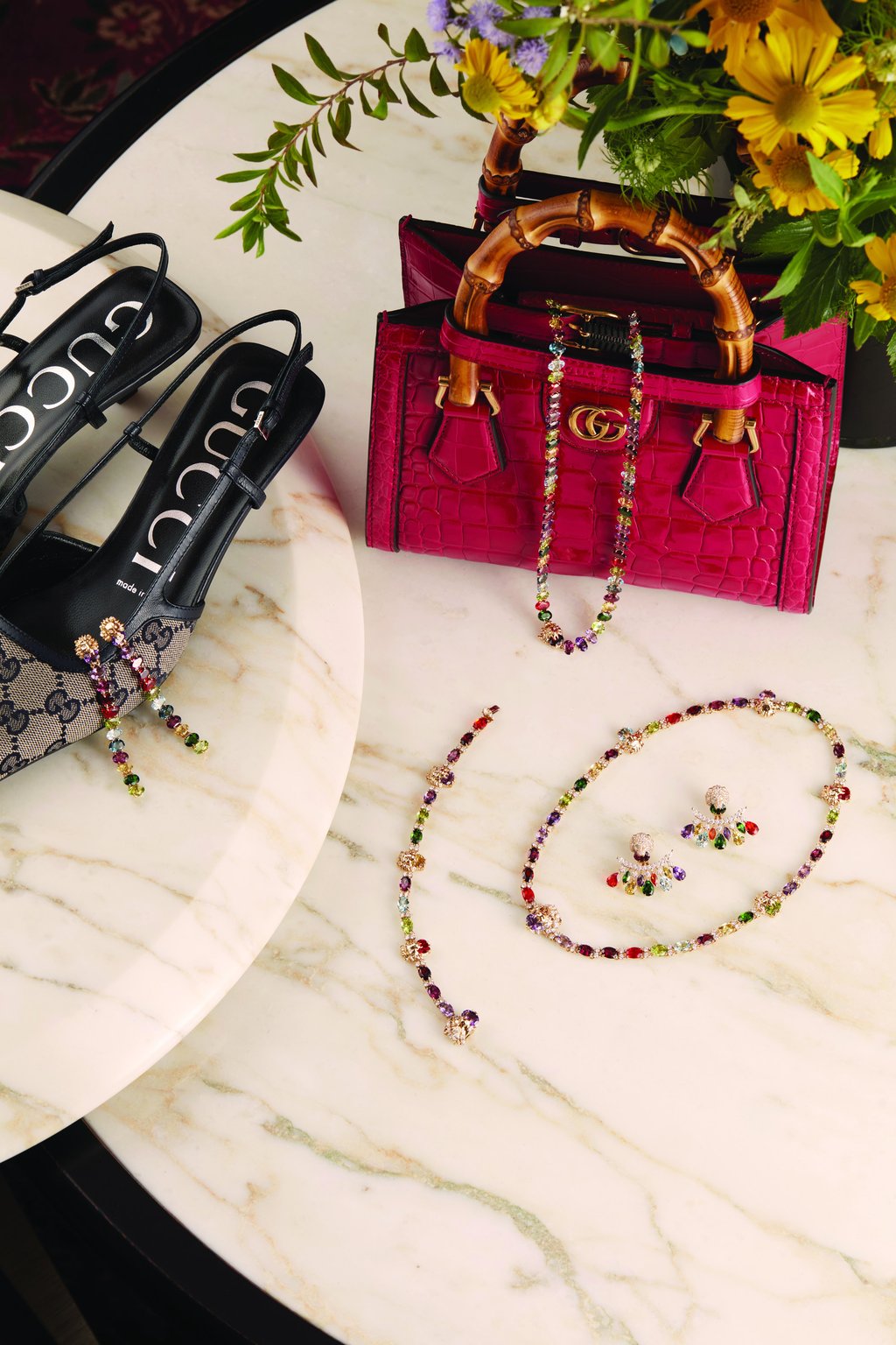 Lion Head necklace x2; Lion Head bracelet; Lion Head jacket earrings; Lion Head earrings. All in 18k yellow gold with multicolour gemstones and diamonds.