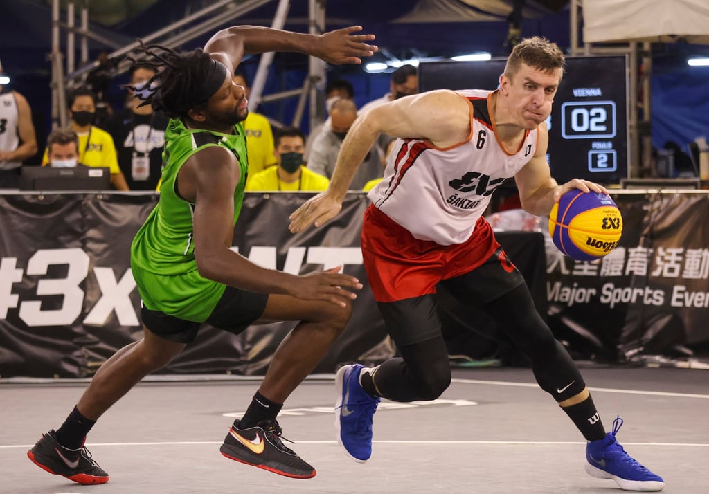 Sakiai Gulbele’s Marijus Uzupis dribble past Quincy Diggs of Vienna in their semi-final of the FIBA 3X3 World Tour stop in Hong Kong. Photo: Jonathan Wong Sakiai Gulbele’s Marijus Uzupis dribble past Quincy Diggs of Vienna in their semi-final of the FIBA 3X3 World Tour stop in Hong Kong. Photo: Jonathan Wong