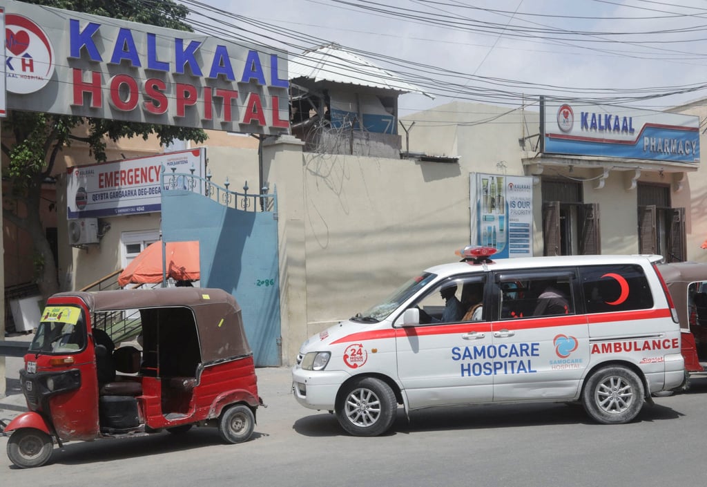 An ambulance drives a wounded person to hospital after al-Shabab militants attacked the Villa Rose hotel in Mogadishu, Somalia on Monday. Photo: Reuters