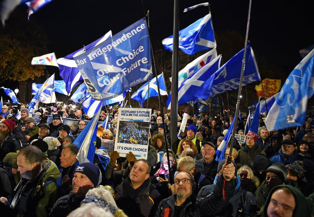 Pro-Scottish independence supporters wave flags during a rally outside parliament in Edinburgh on November 23, 2022, after the United Kingdom’s Supreme Court rejected Scottish independence vote plans. Photo: TNS Pro-Scottish independence supporters wave flags during a rally outside parliament in Edinburgh on November 23, 2022, after the United Kingdom’s Supreme Court rejected Scottish independence vote plans. Photo: TNS
