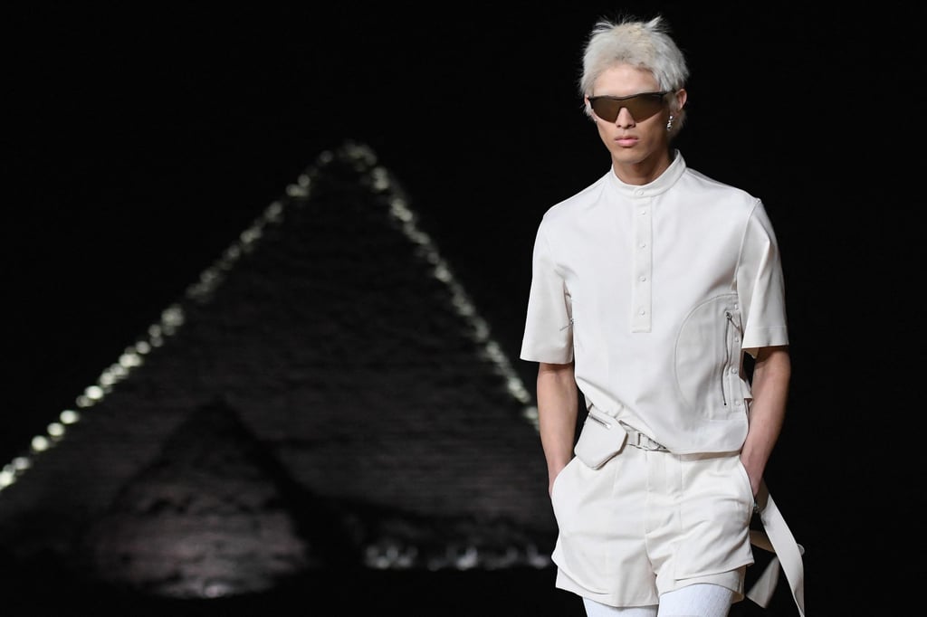 Christian Dior’s autumn men’s collection gave a space-age impression against the Giza pyramids on December 3. Photo: AFP