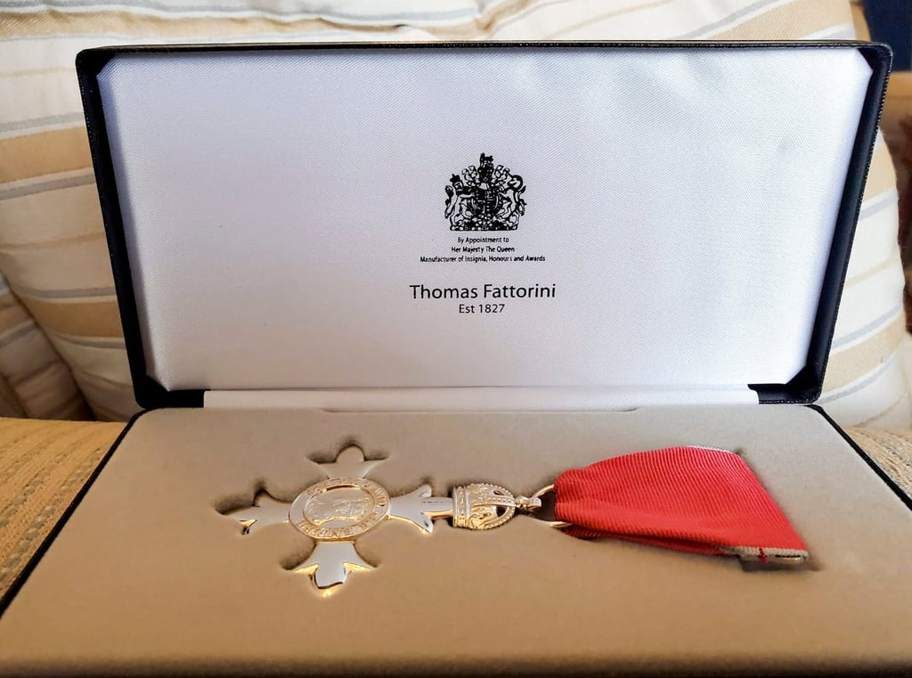 Manohar Melwani, owner of Sam’s Tailor, was officially awarded the Member of the Most Excellent Order of the British Empire. Photo: Handout