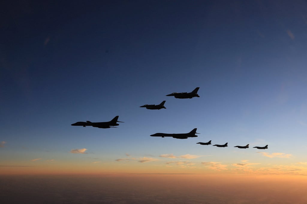 Japanese F-2 fighter jets fly in formation with US F-16s and B-1B bombers during a joint drill off Japan’s southern island of Kyushu last month. Photo: Japanese Defence Ministry Handout via Reuters
