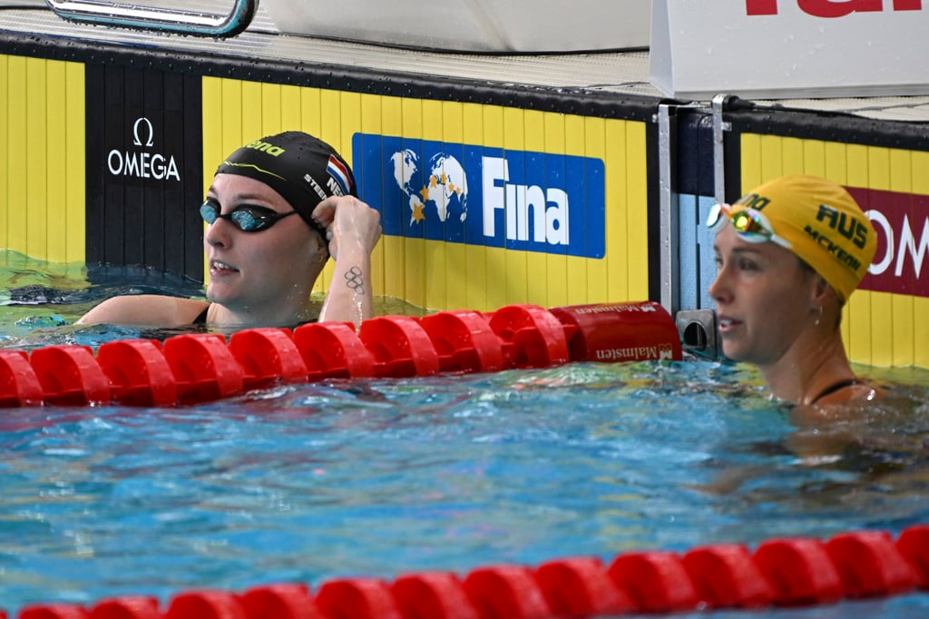 Emma McKeon of Australia (right) and Marrit Steenbergen of the Netherlands clocked the same time. Photo: AP