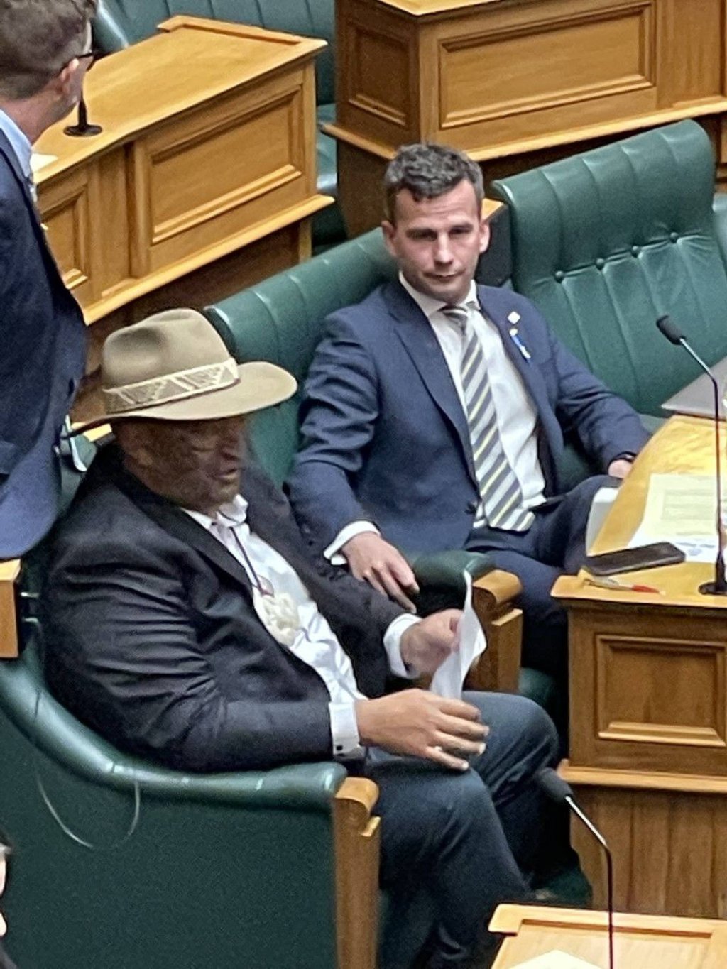 Te Pāti Māori leader Rawiri Waititi (left) takes his seat in parliament next to ACT Party leader David Seymour. Photo: New Zealand Herald