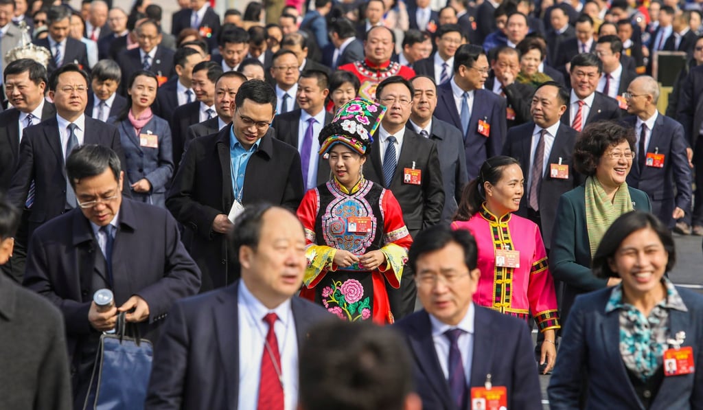 Delegates arrive to attend a session of the NPC meeting on March 8, 2019, at the Great Hall of the People in Beijing. Photo: Simon Song