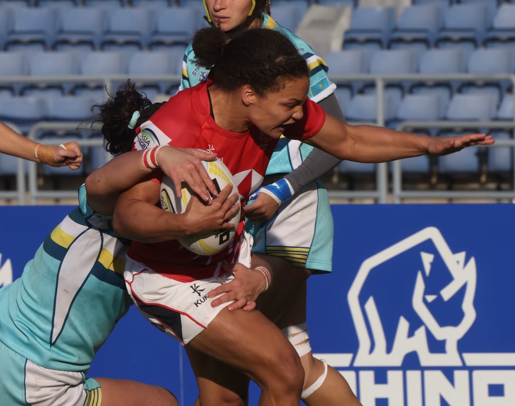 Hong Kong’s Natasha Olsen-Thorne is tackled during the first Test against Kazakhstan at Siu Sai Wan Sports Ground. Photo: Jonathan Wong