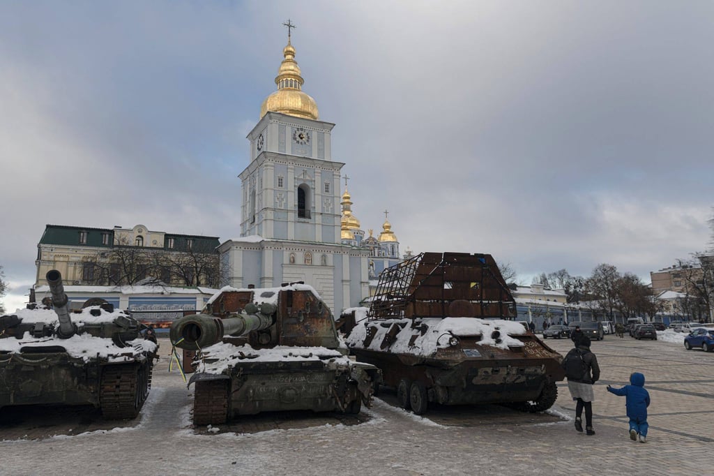 Residents walk past an exhibit of destroyed Russian military equipment in Kyiv, Ukraine. Photo: Bloomberg