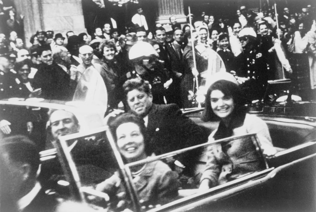 US President John F. Kennedy (centre) and first lady Jacqueline Kennedy (right) are pictured riding in the presidential motorcade moments before Kennedy was shot in Dallas, Texas, on November 22, 1963. Victor Hugo King/Library of Congress via Reuters US President John F. Kennedy (centre) and first lady Jacqueline Kennedy (right) are pictured riding in the presidential motorcade moments before Kennedy was shot in Dallas, Texas, on November 22, 1963. Victor Hugo King/Library of Congress via Reuters