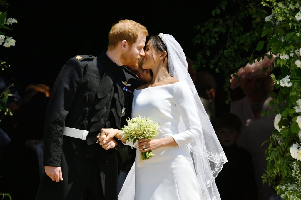 Prince Harry and Meghan Markle kiss on the steps of St George’s Chapel in Windsor Castle after their wedding in May 2018, in Windsor, England. Photo: TNS Prince Harry and Meghan Markle kiss on the steps of St George’s Chapel in Windsor Castle after their wedding in May 2018, in Windsor, England. Photo: TNS
