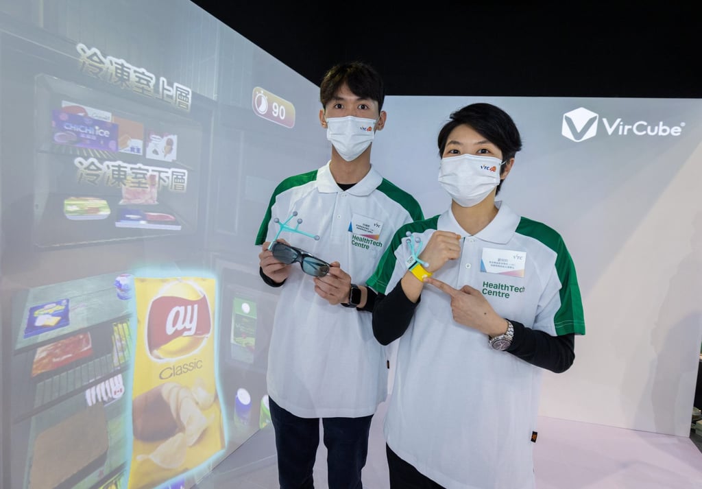 Students demonstrate the CAVE Rehabilitation Service Project developed for Alzheimer’s patients. Photo: SCMP