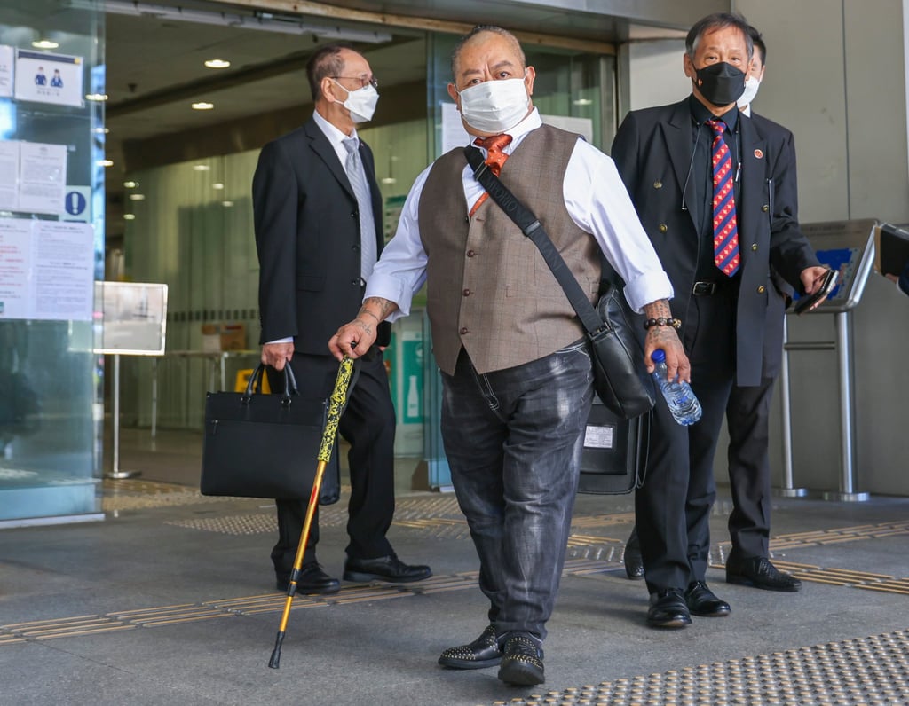 Wu Ping-hung (centre) was found to be in charge of the premises. Photo: Nora Tam Wu Ping-hung (centre) was found to be in charge of the premises. Photo: Nora Tam
