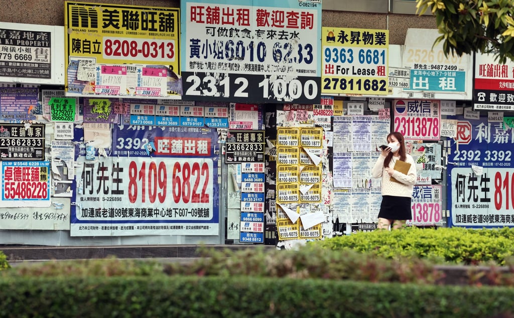 A woman walks past vacant shops in Tsim Sha Tsui on December 5, 2022. Photo: K. Y. Cheng A woman walks past vacant shops in Tsim Sha Tsui on December 5, 2022. Photo: K. Y. Cheng