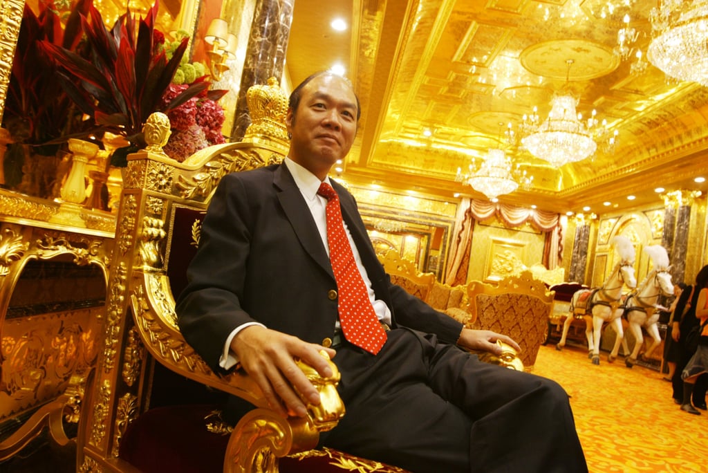 The late Lam Sai-wing, former chairman of Hang Fung Gold Technology Group, sits in his US$38 million golden showroom in Hong Kong’s Kowloon area. Photo: Dickson Lee The late Lam Sai-wing, former chairman of Hang Fung Gold Technology Group, sits in his US$38 million golden showroom in Hong Kong’s Kowloon area. Photo: Dickson Lee