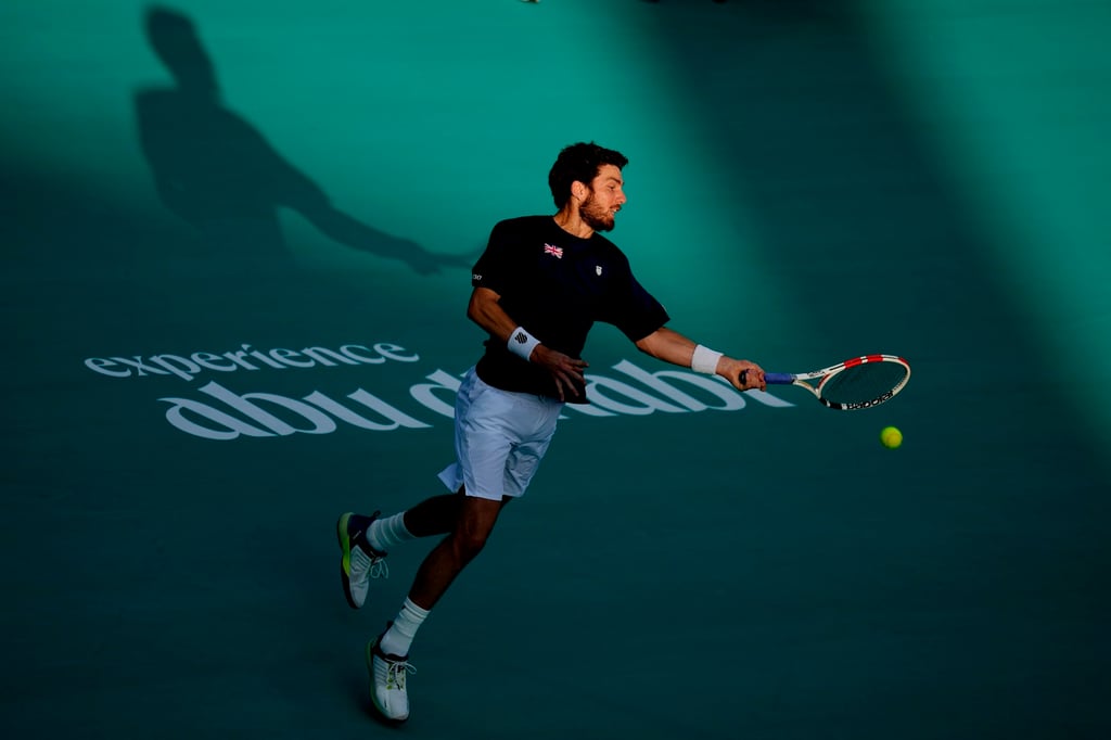 Cameron Norrie eturns the ball to Stefanos Tsitsipas during a match of the Mubadala World Tennis Championship in Abu Dhabi. Photo: AP Cameron Norrie eturns the ball to Stefanos Tsitsipas during a match of the Mubadala World Tennis Championship in Abu Dhabi. Photo: AP