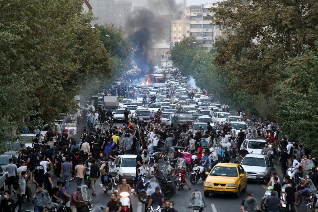Protesters clash with police following the death of 22-year-old Mahsa Amini in Tehran, Iran, in September. Hundreds of people have since died. Photo: EPA-EFE/STR