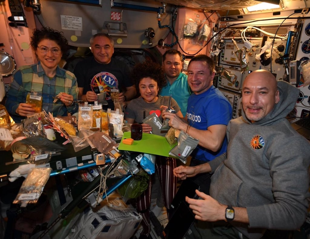 The crew of the International Space Station share a special Thanksgiving meal in 2019. Trips to Mars will require producing food that remains nutritious for five years. Photo: Nasa The crew of the International Space Station share a special Thanksgiving meal in 2019. Trips to Mars will require producing food that remains nutritious for five years. Photo: Nasa