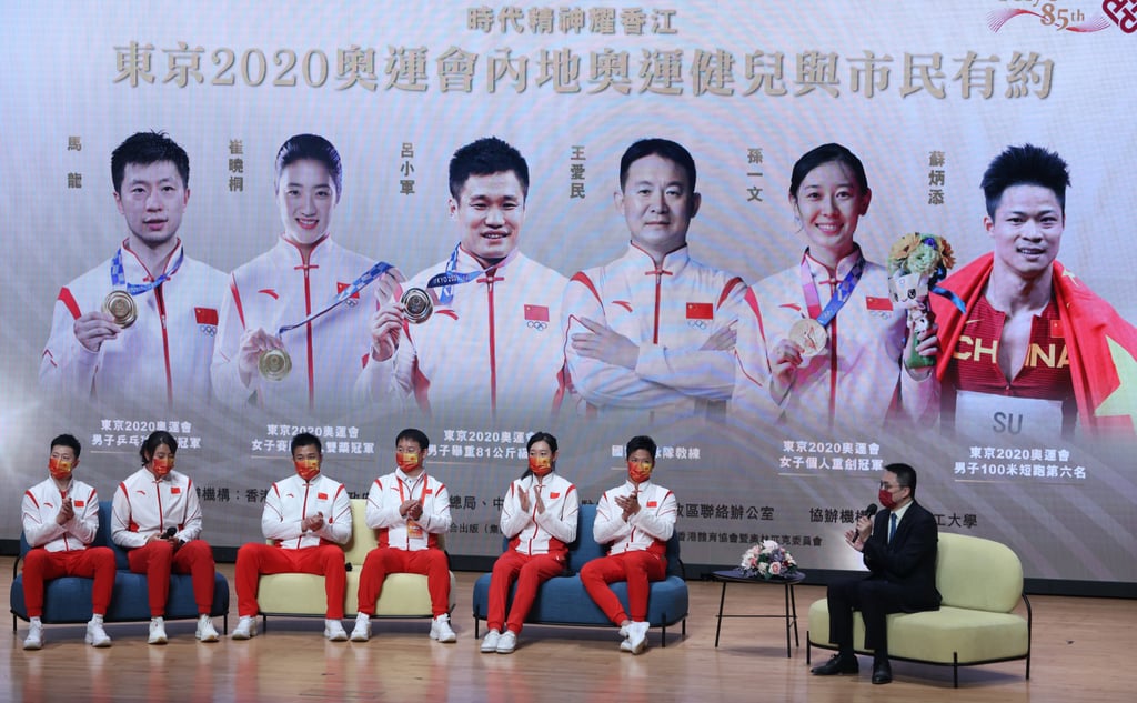 Chinese Olympians (left to right) Ma Long, Cui Xiaotong, Lyu Xiaojun, coach Wang Aimin, Sun Yiwen and Su Bingtian at an engagement session with students at PolyU and residents at Hong Kong Polytechnic University (PolyU) in Hung Hom in December 2021. Photo: May Tse Chinese Olympians (left to right) Ma Long, Cui Xiaotong, Lyu Xiaojun, coach Wang Aimin, Sun Yiwen and Su Bingtian at an engagement session with students at PolyU and residents at Hong Kong Polytechnic University (PolyU) in Hung Hom in December 2021. Photo: May Tse