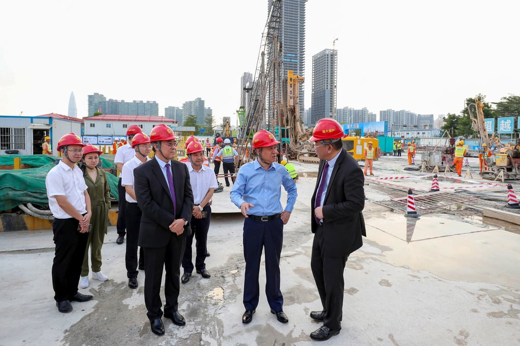 Hui Ka-yan (second right) visits the construction site of the company’s planned headquarters in Shenzhen in 2019. The company sold the site to a group of state-owned firms last month. Photo: Handout Hui Ka-yan (second right) visits the construction site of the company’s planned headquarters in Shenzhen in 2019. The company sold the site to a group of state-owned firms last month. Photo: Handout