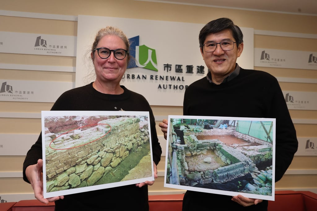 Julie Van Den Bergh and Tony Lam with images of some of the archaeological finds at Nga Tsin Wai Tsuen village in Kowloon. Photo: Edmond So