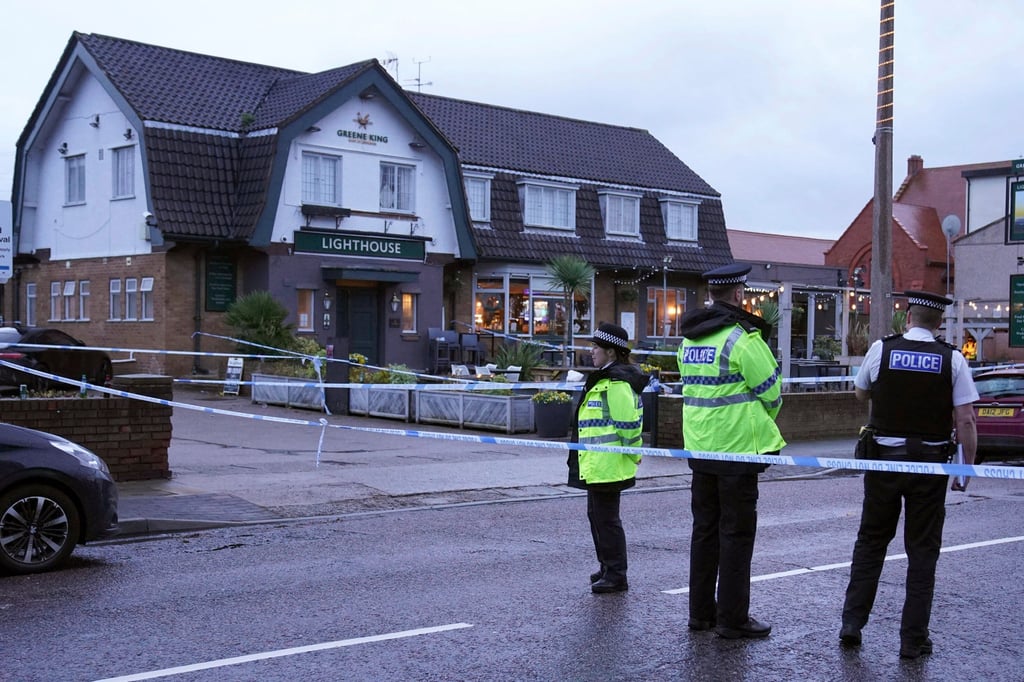 The Merseyside Police force is investigating the shooting at the Lighthouse pub in the town of Wallasey as a murder case. Police have not detained any suspects. Photo: PA via AP