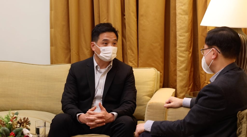 Stephen Wong (left) with Chief Executive John Lee. Photo: Handout Stephen Wong (left) with Chief Executive John Lee. Photo: Handout