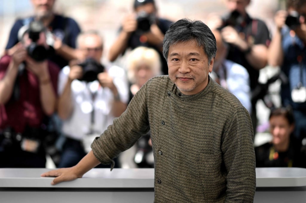 Hirokazu Kore-Eda attends a photo call for his film “Broker during the Cannes Film Festival. Photo: AFP