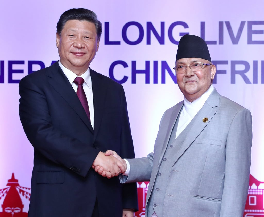 Chinese President Xi Jinping shakes hands with Nepal’s then-Prime Minister K.P. Sharma Oli during a visit to Kathmandu in 2019. Photo: Xinhua