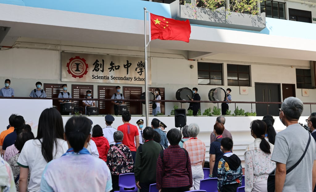 A flag-raising ceremony at Scientia Secondary School in Ho Man Tin. Secondary Five students are required to join study tours to the mainland as part of a revamped liberal studies programme. Photo: May Tse A flag-raising ceremony at Scientia Secondary School in Ho Man Tin. Secondary Five students are required to join study tours to the mainland as part of a revamped liberal studies programme. Photo: May Tse