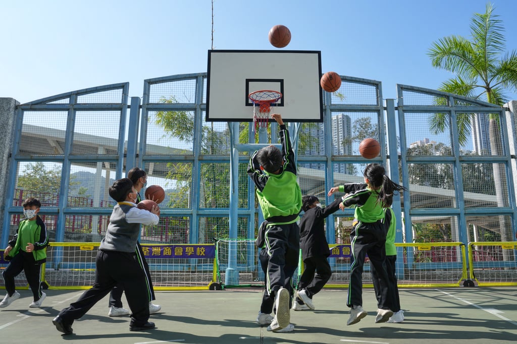 Hong Kong students have been wearing masks at schools since 2021. Photo: Elson Li Hong Kong students have been wearing masks at schools since 2021. Photo: Elson Li