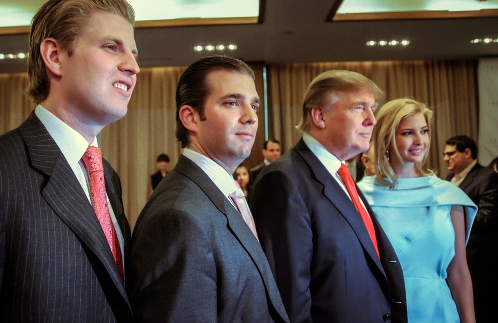 Donald Trump, second from right, chairman and CEO of the Trump Organization, poses with his children, from left, Eric, Donald Jr. and Ivanka, at the opening of the Trump Soho New York, in April 2010. Photo: AP