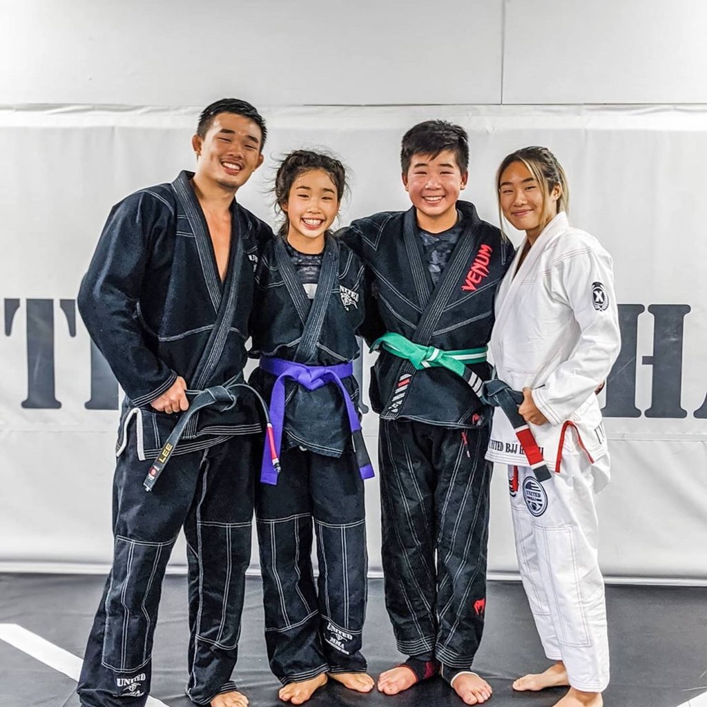 Christian Lee (left), Victoria Lee (second left), Adrian Lee (second right) and Angela Lee (right) together at the United BJJ Hawaii gym. Photo: Instagram