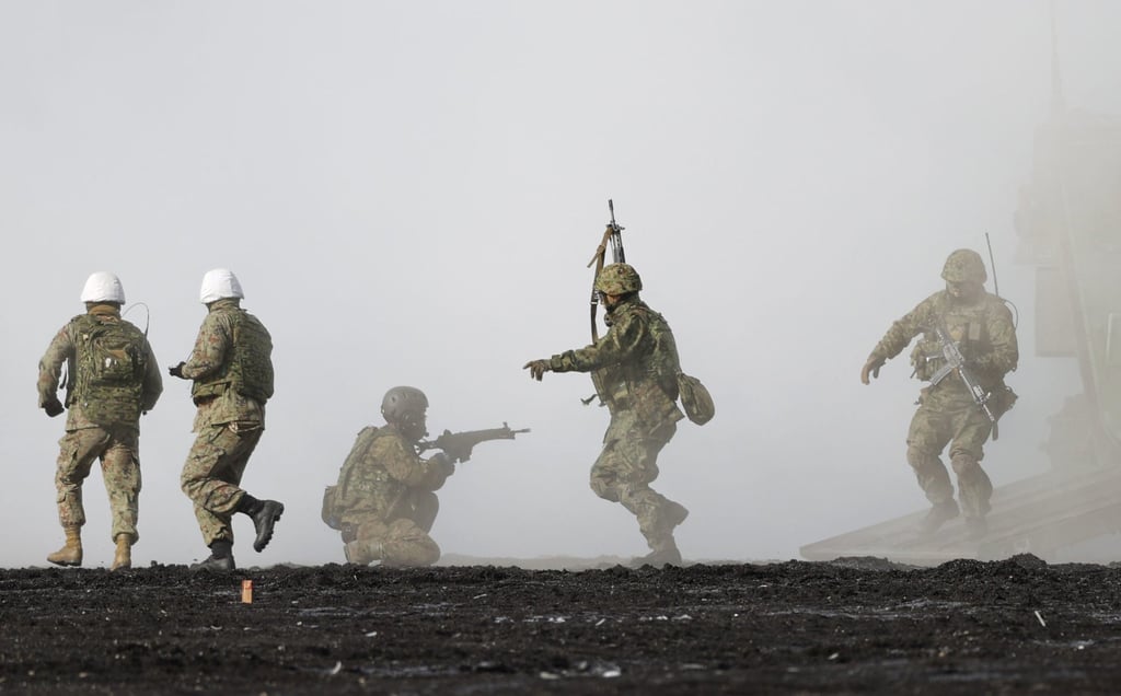 Japanese soldiers and US marines take part in a joint amphibious exercise in Japan in March last year. Photo: Kyodo Japanese soldiers and US marines take part in a joint amphibious exercise in Japan in March last year. Photo: Kyodo