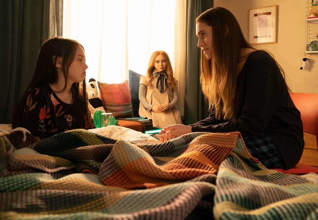 (From left) Violet McGraw as Cady, Amie Donald as M3GAN, and Allison Williams as Gemma in a still from M3GAN. Photo: Universal Pictures