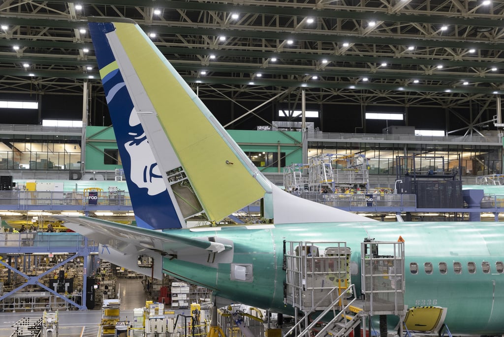 Boeing employees work on the 737 MAX on the final assembly line at Boeing’s Renton plant, on June 15, 2022, in Washington. Photo: TNS Boeing employees work on the 737 MAX on the final assembly line at Boeing’s Renton plant, on June 15, 2022, in Washington. Photo: TNS