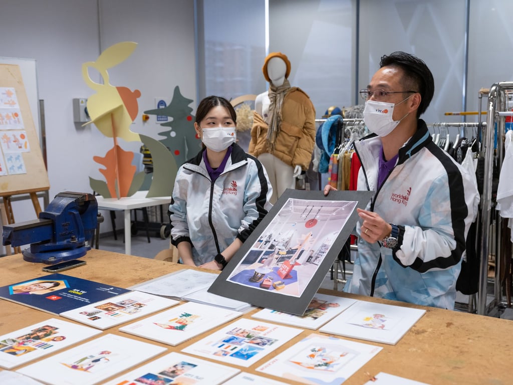 Leo Chan (right), the chief expert in Visual Merchandising at the event, mentored Kaitlyn Leung through the competition. Photo: Josh Chow / SCMP