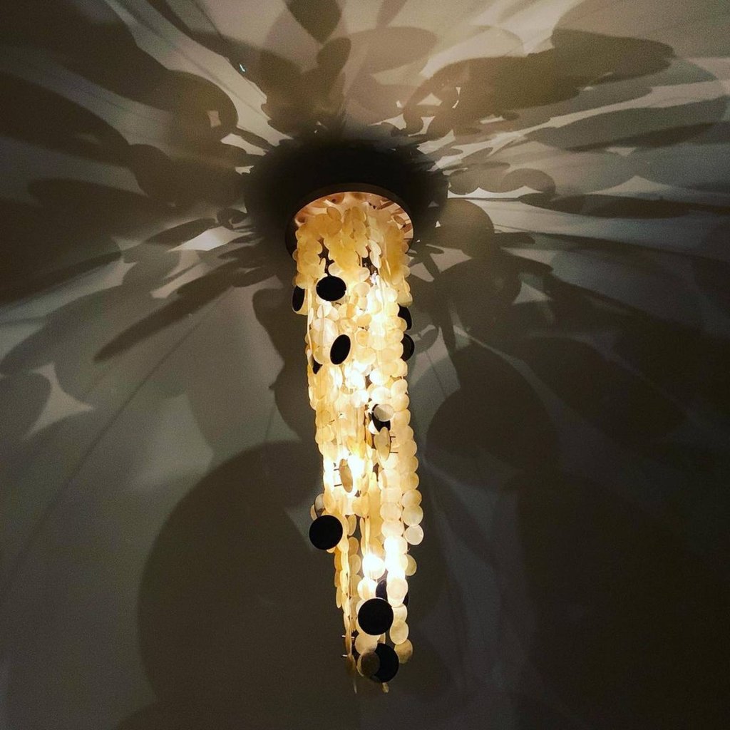 NEA’s Solar Chandelier is made with seashells. Photo: @nea.studio/Instagram