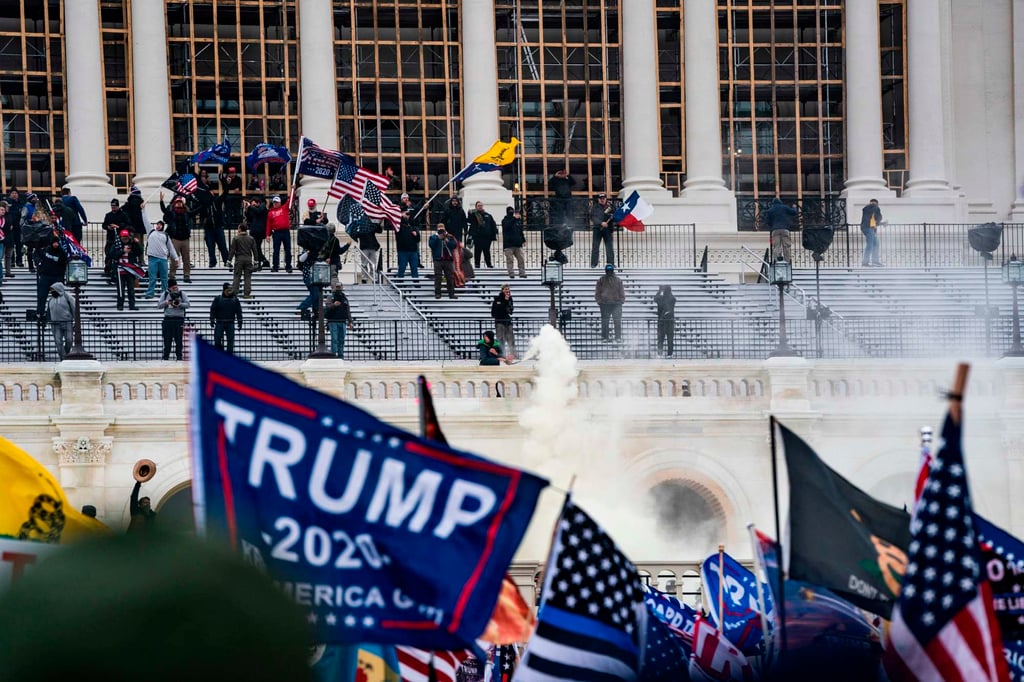 Trump supporters, including many members of extremist groups like the Proud Boys, clash with the US Capitol police on January 6, 2021. Photo: TNS