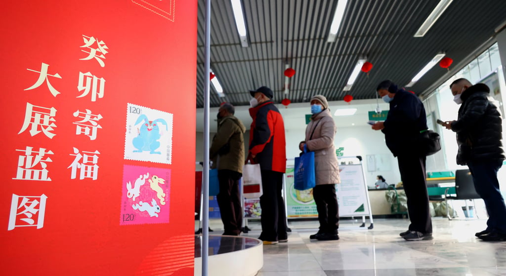 Collectors queue up to buy special stamps marking the Year of the Rabbit at a post office in Haizhou District of Lianyungang, east China’s Jiangsu province Photo: Xinhua
