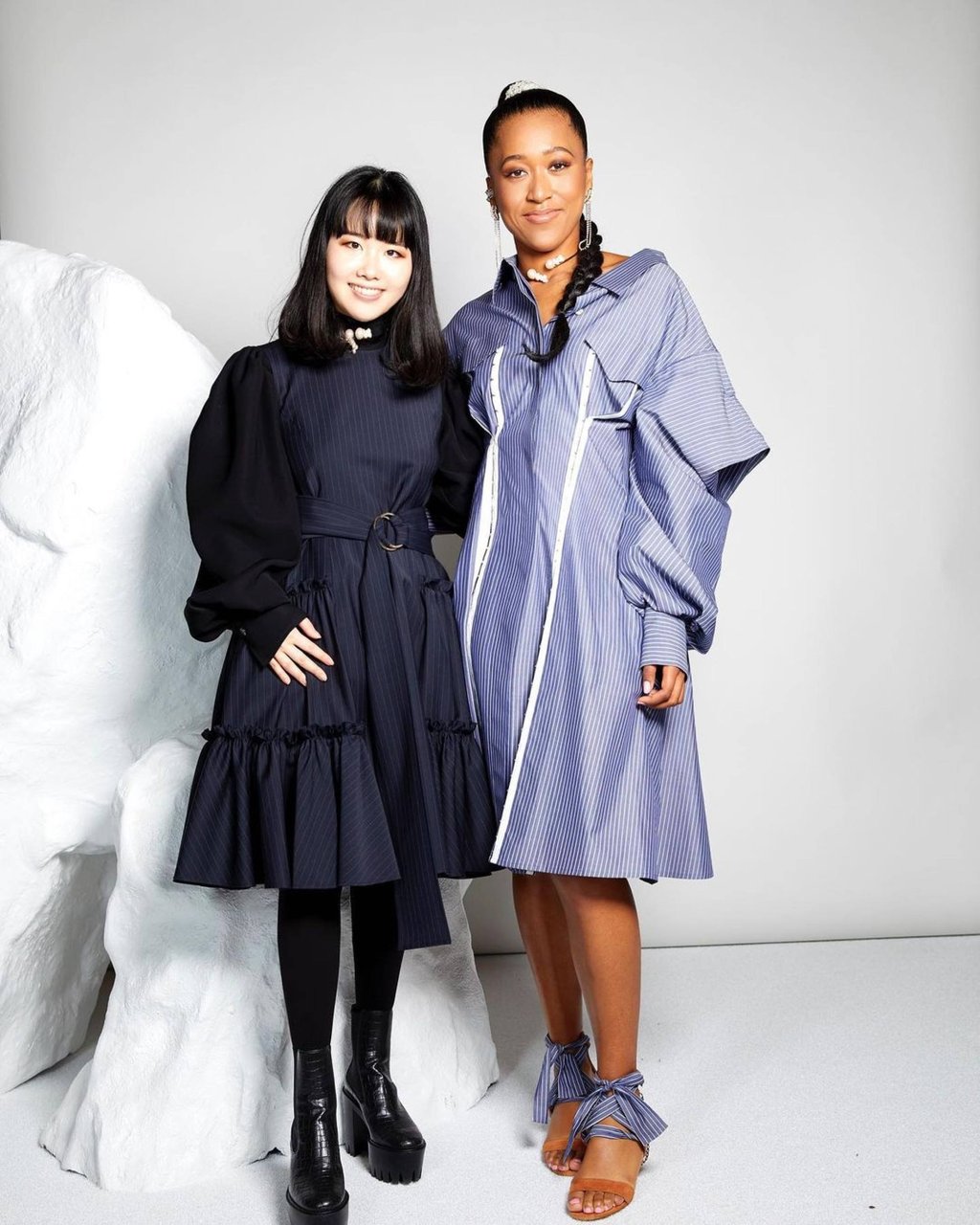 6 of Naomi Osaka s best fashion moments off the court the tennis champ has deals with Nike and Levi s wore Louis Vuitton at the Met Gala 2021 and promoted Black Lives Matter