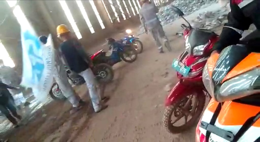 Employees gather amid clashes between Chinese and Indonesian workers at a nickel smelter in Morowali, Sulawesi, Indonesia on Monday. Photo: Revi Limbong via Reuters